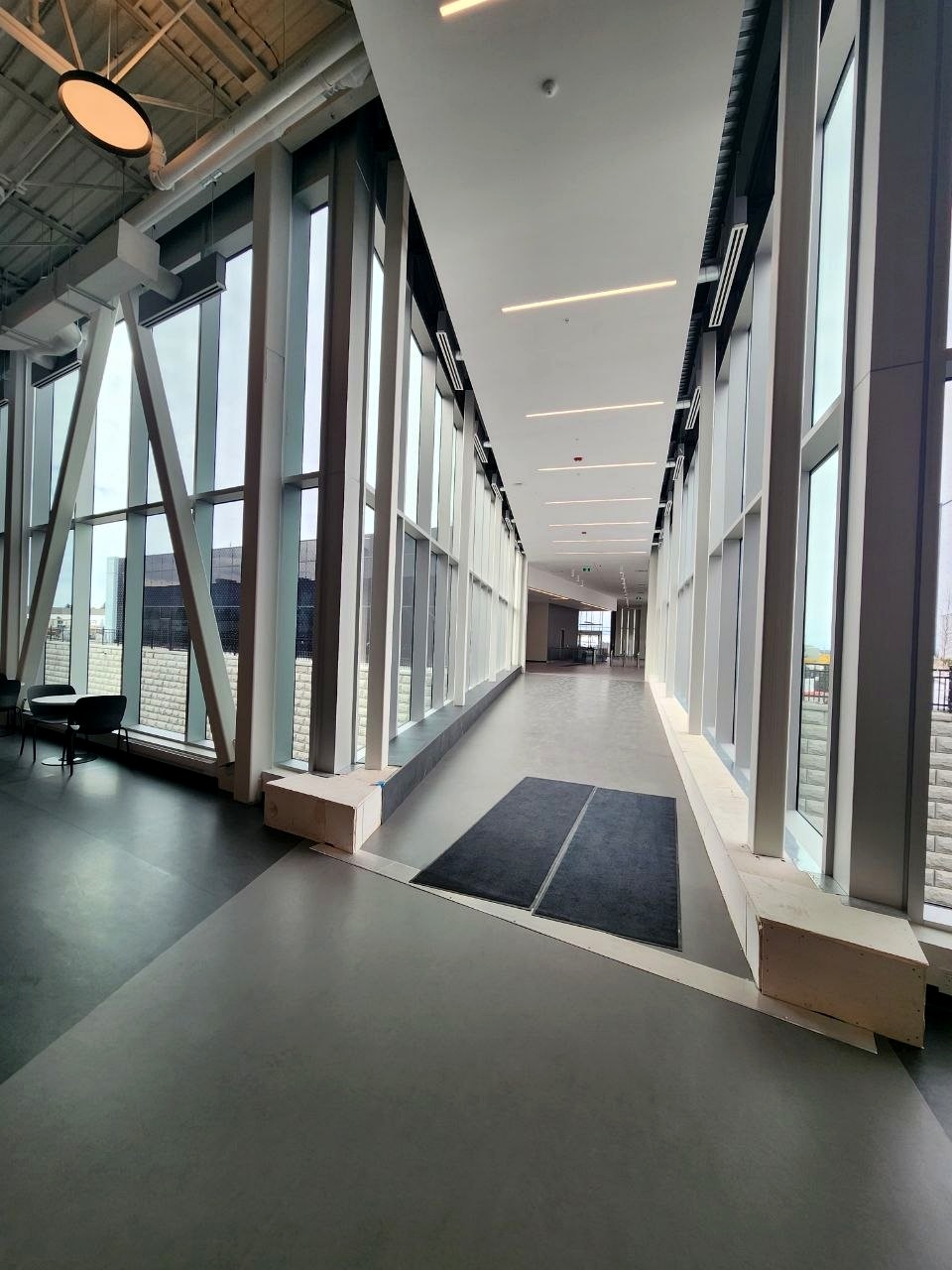 Bright finished corridor with windows
